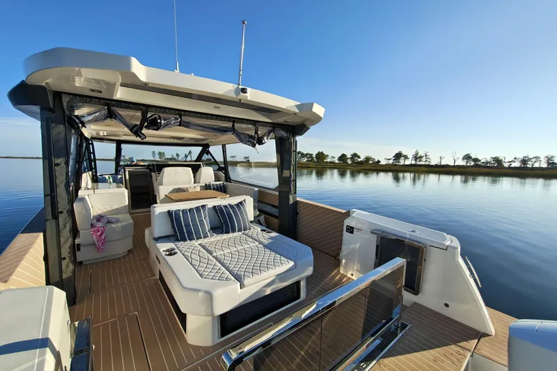 Slide: The Image of Aerial view of 2025 Saxdor 400 GTO yacht on green water. - 15