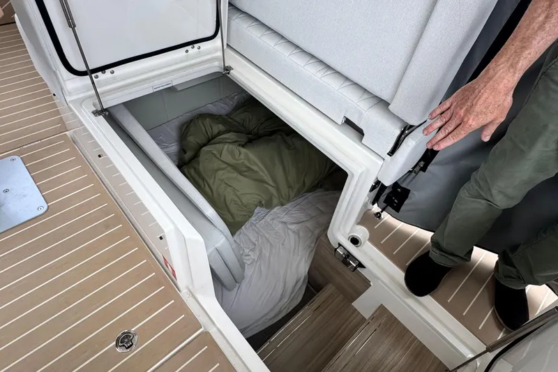 Slide: The Image of Luxurious seating area on 2025 Saxdor 400 GTO yacht with elegant cushions and wooden table. - 22