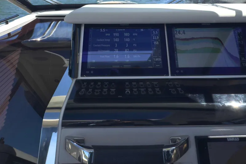 Slide: The Image of Dashboard of 2025 Saxdor 400 GTO with navigation and engine displays. - 32