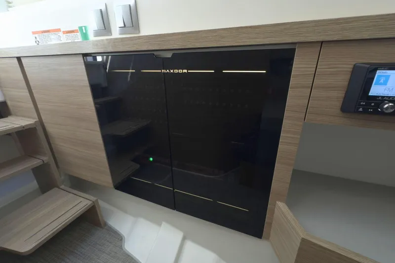 Slide: The Image of Luxurious cabin bed in the 2025 Saxdor 400 GTO yacht, featuring a plush mattress. - 43