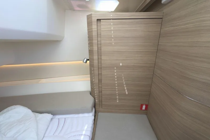 Slide: The Image of Control panel of 2025 Saxdor 400 GTO boat, featuring switches and circuit breakers. - 46