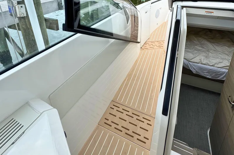 Slide: The Image of Interior of 2025 Saxdor 400 GTO with modern wooden cabinetry design. - 52