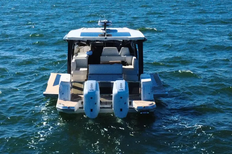 Slide: The Image of 2025 Saxdor 400 GTO cruising on open sea under clear blue sky. - 6