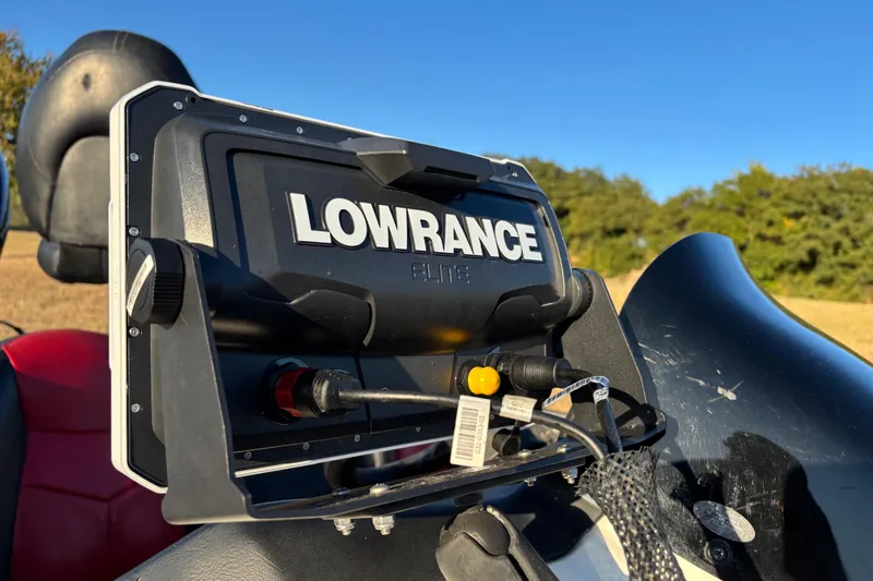 Slide: The Image of 2011 Skeeter ZX250 boat on trailer, close-up view of hull and branding. - 12