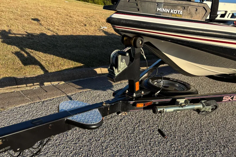 Slide: The Image of 2011 Skeeter ZX250 trailer with Goodyear Marathon tire on asphalt. - 15