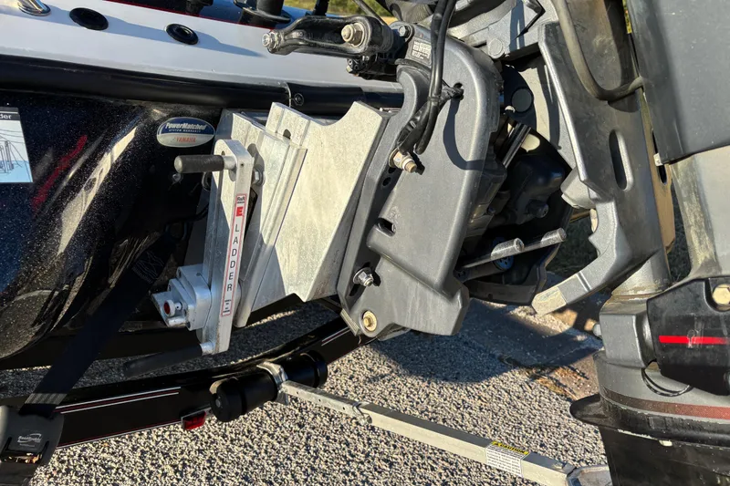 Slide: The Image of 2011 Skeeter ZX250 boat with Yamaha 250 engine on a sunny street. - 19