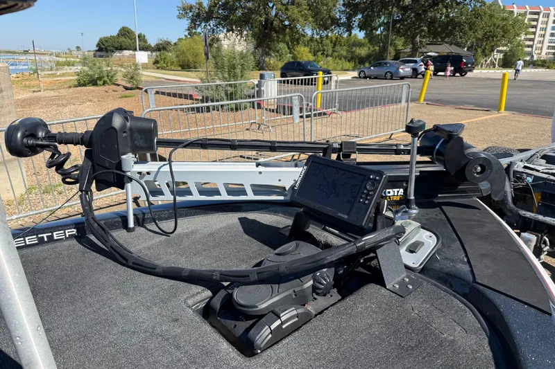 Slide: The Image of 2011 Skeeter ZX250 boat with advanced navigation and fishing equipment on deck. - 82