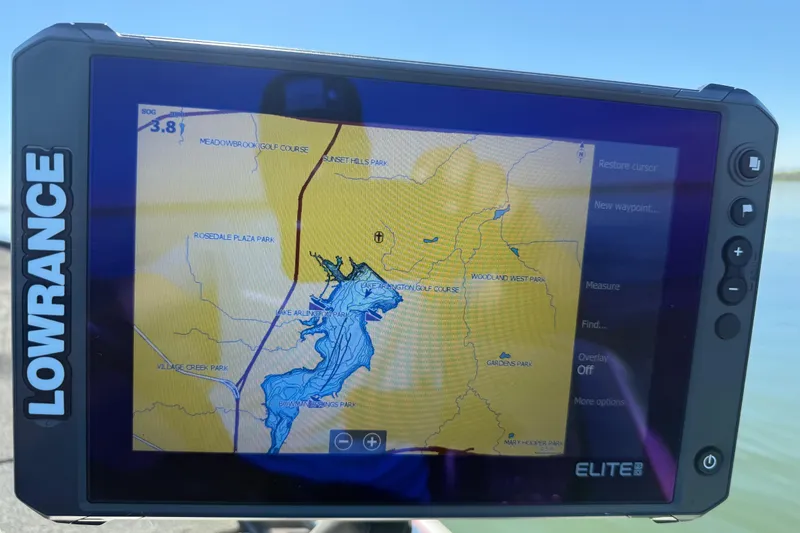 Slide: The Image of Lowrance Elite GPS displaying a detailed map on a 2011 Skeeter ZX250 boat. - 90