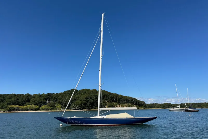 The Image of 2018 Leonardo Yachts Eagle 44 sailboat on calm water with clear blue sky. - 0