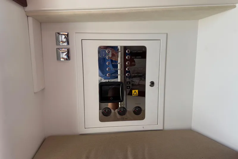 Slide: The Image of Control panel inside 2018 Leonardo Yachts Eagle 44, featuring switches and indicators. - 18