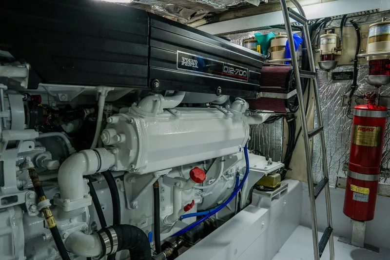 Slide: The Image of Engine room of 2002 Cruisers 5370 yacht with Volvo Penta D12-700 engine. - 42