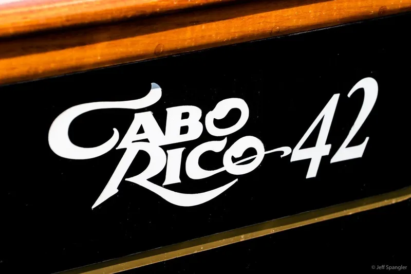 Slide: The Image of Cabo Rico 42 Pilot 2005 boat nameplate with elegant typography. - 21