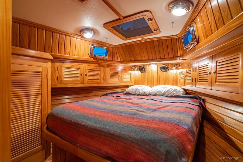 Slide: The Image of Luxurious wooden cabin interior of 2005 Cabo Rico 42 Pilot yacht. - 28
