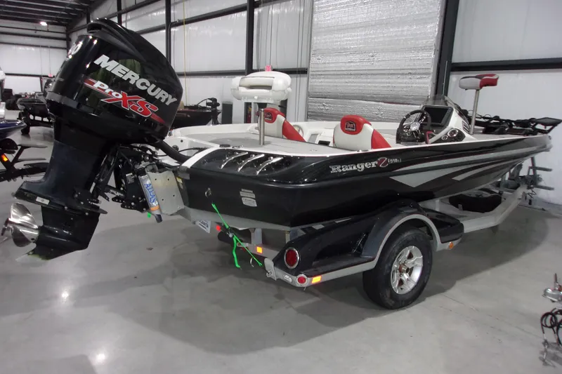 Slide: The Image of 2017 Ranger Z518 Intracoastal boat with Mercury Pro XS engine in a showroom. - 3