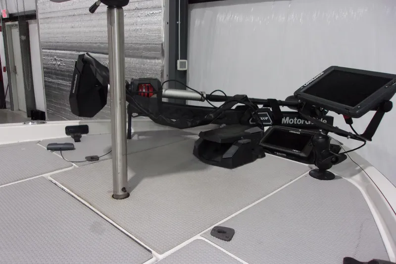 Slide: The Image of 2017 Ranger Z518 Intracoastal boat deck with advanced navigation equipment and controls. - 8