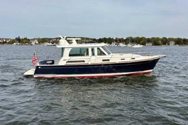 Slide: The Image of Interior view of 2015 Sabre 42 Salon Express yacht cockpit with helm and seating. - 12
