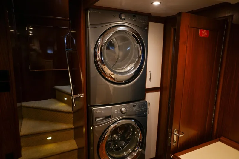 Slide: The Image of Cozy twin cabin with ocean-themed mural in 1980 Hatteras 70 Motor Yacht. - 22