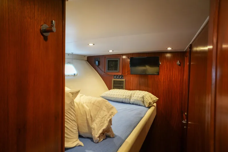 Slide: The Image of Interior of 1980 Hatteras 70 Motor Yacht with stacked washer and dryer. - 24