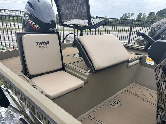 Slide: The Image of Thor 1900 Lake Hammer Center Console Elite 2026 - 13