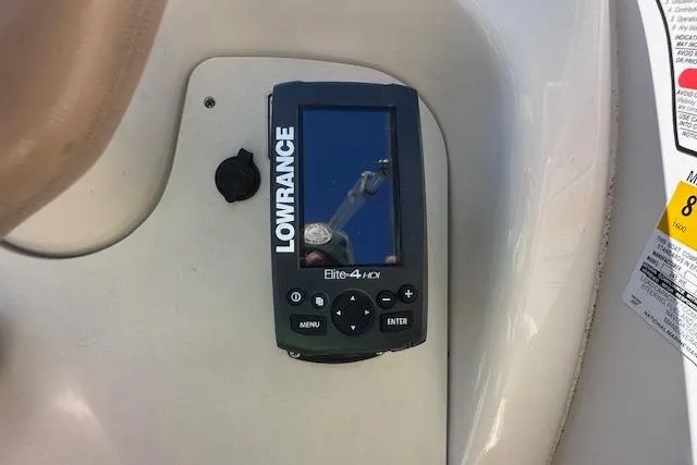 Slide: The Image of Lowrance Elite-4 HDI fishfinder on 2001 Sea Ray 245 Weekender boat dashboard. - 17