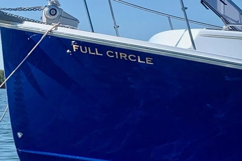 Slide: The Image of Blue 2006 Duffy 37 Downeast boat named "Full Circle" on water. - 17