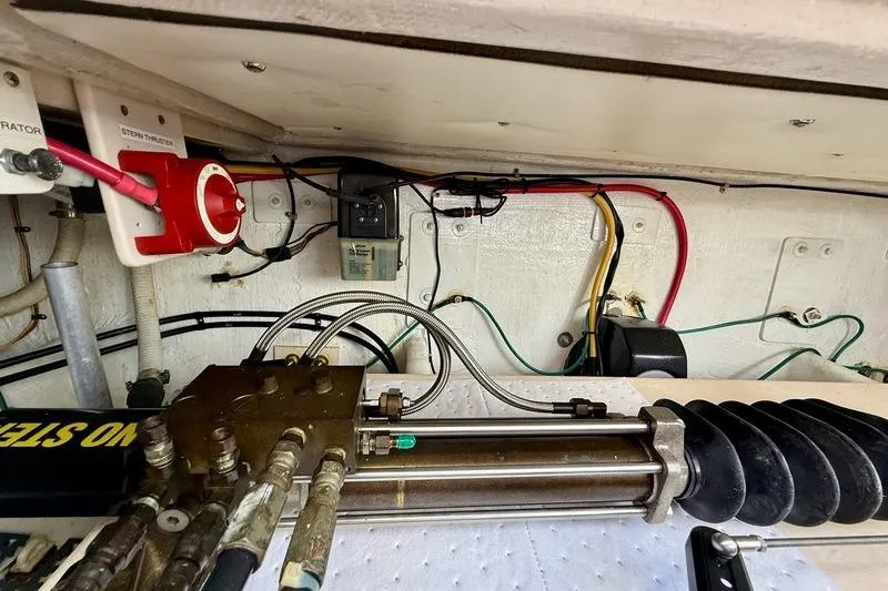 Slide: The Image of Engine compartment of a 2006 Duffy 37 Downeast boat, showing hydraulic and electrical systems. - 22