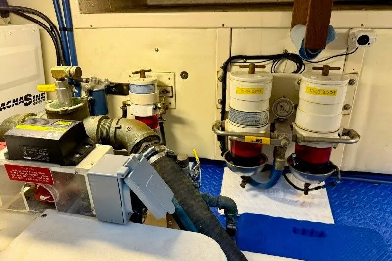 Slide: The Image of Engine room of 2006 Duffy 37 Downeast boat with fuel filters and machinery. - 53