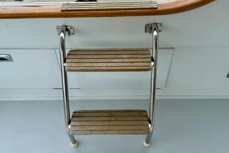 Slide: The Image of Stainless steel and wood boat ladder on 2006 Duffy 37 Downeast. - 65