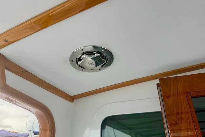 Slide: The Image of Ceiling vent on 2006 Duffy 37 Downeast boat with wooden trim details. - 66