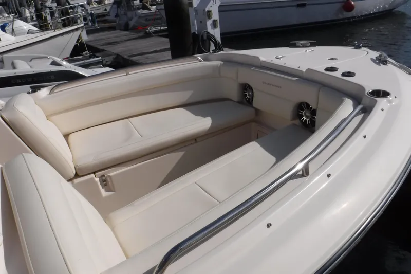 Slide: The Image of 2020 Grady-White Freedom 285 boat interior with plush seating and stainless steel accents. - 16