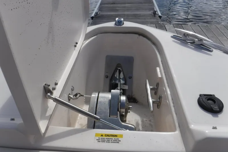 Slide: The Image of Anchor locker of 2020 Grady-White Freedom 285 boat at dockside. - 21