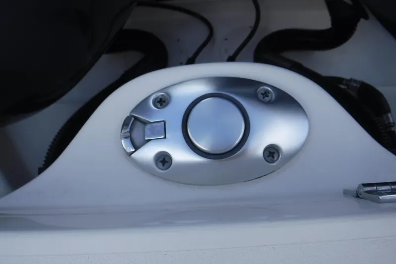 Slide: The Image of Close-up of a 2020 Grady-White Freedom 285 boat component, featuring a metallic fixture. - 25