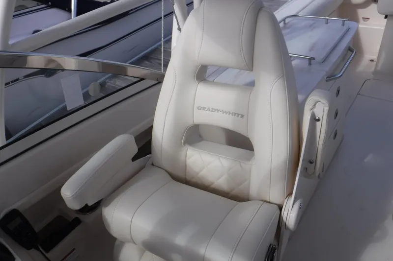 Slide: The Image of Luxurious seating on 2020 Grady-White Freedom 285 boat, featuring premium white upholstery. - 29