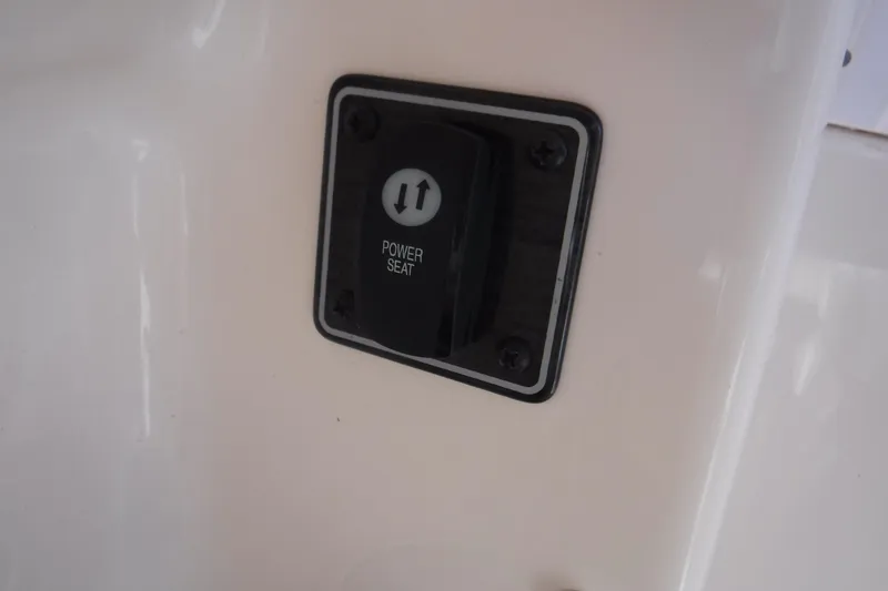 Slide: The Image of Power seat control switch on 2020 Grady-White Freedom 285 boat. - 33