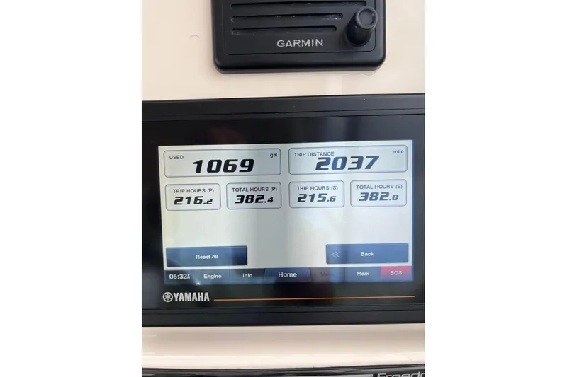 Slide: The Image of Yamaha display on 2020 Grady-White Freedom 285 showing fuel and trip data. - 4
