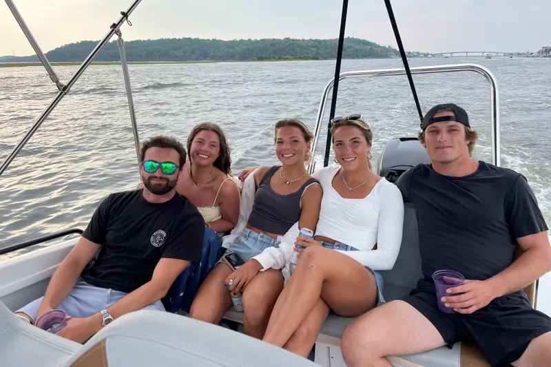 Slide: The Image of Group enjoying a ride on a 2022 Beneteau Flyer 8 SUNdeck boat. - 20