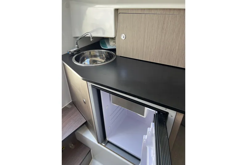 Slide: The Image of Compact kitchenette in 2022 Beneteau Flyer 8 SUNdeck with sink and mini fridge. - 26