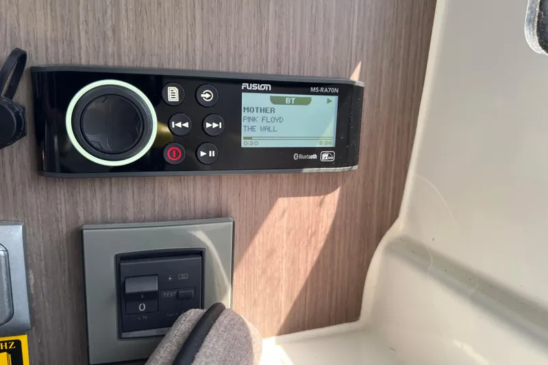 Slide: The Image of Fusion stereo system on 2022 Beneteau Flyer 8 SUNdeck, playing Pink Floyd's "Mother." - 27