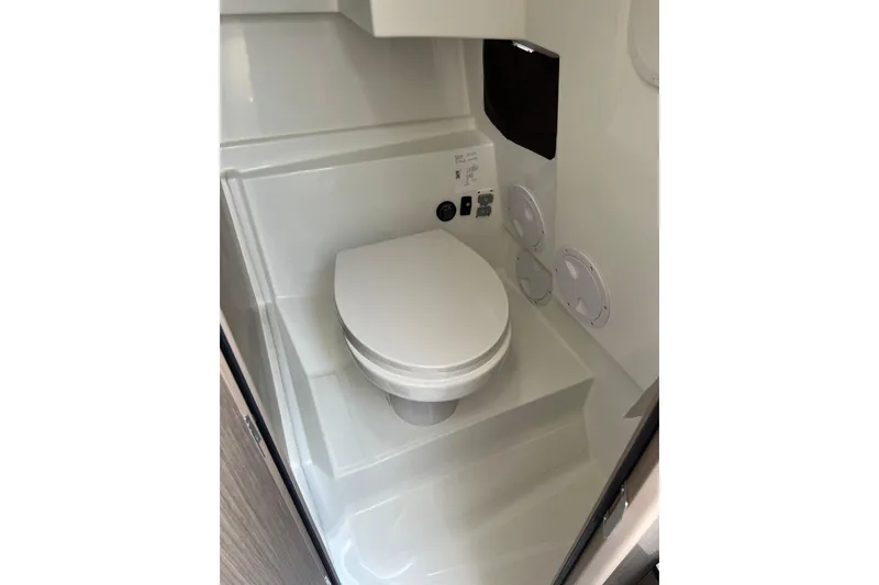 Slide: The Image of Interior of 2022 Beneteau Flyer 8 SUNdeck boat bathroom with modern toilet. - 28