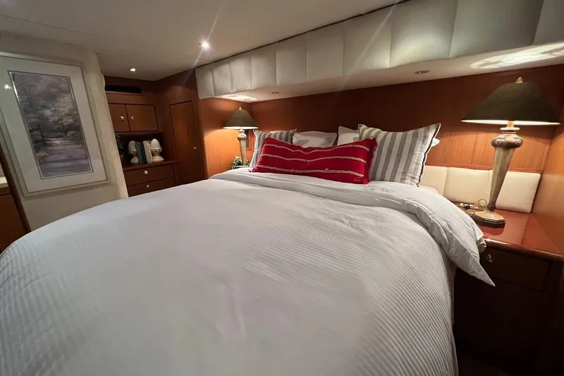 Slide: The Image of Luxurious bedroom interior of 2002 Ocean Yachts 56 Super Sport with elegant decor. - 15