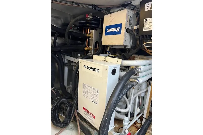 Slide: The Image of Engine room of 2002 Ocean Yachts 56 Super Sport with Dometic equipment and wiring. - 54