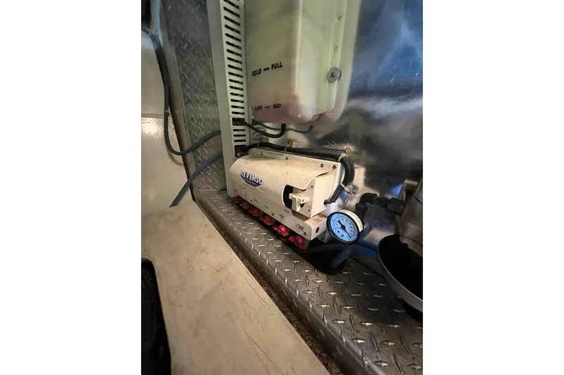 Slide: The Image of Engine room of 2002 Ocean Yachts 56 Super Sport with Reverso oil change system. - 55