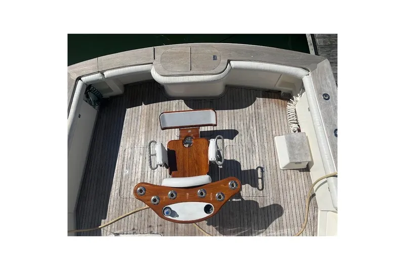 Slide: The Image of 2002 Ocean Yachts 56 Super Sport fishing deck with chair and rod holders. - 57