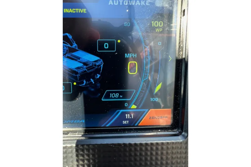 Slide: The Image of 2022 Moomba Makai dashboard display showing speed, hours, and settings. - 17