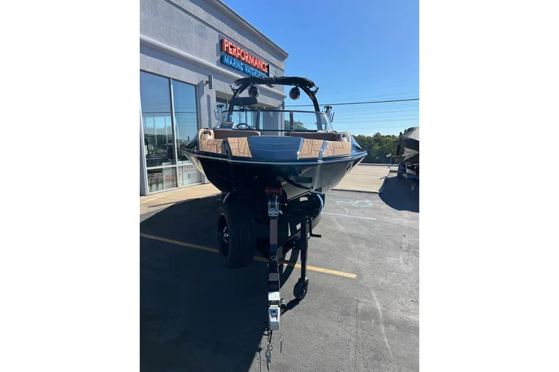 Slide: The Image of 2022 Moomba Makai boat on trailer at Performance Marine dealership. - 7