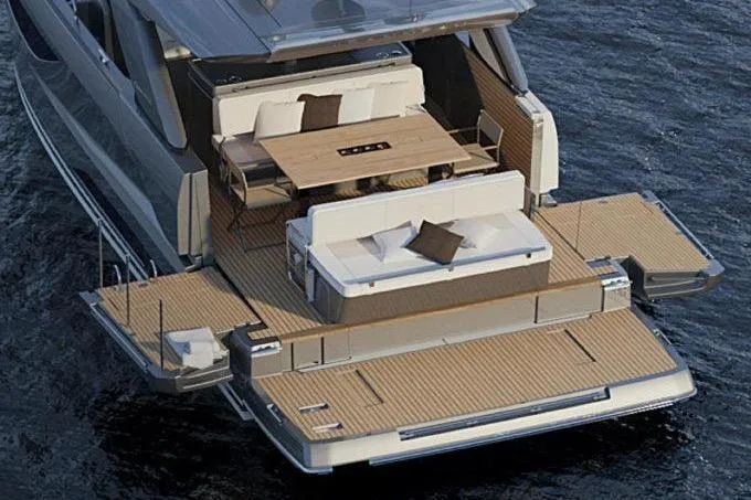 Slide: The Image of 2026 Jeanneau DB 43 yacht with elegant deck and seating area on water. - 4