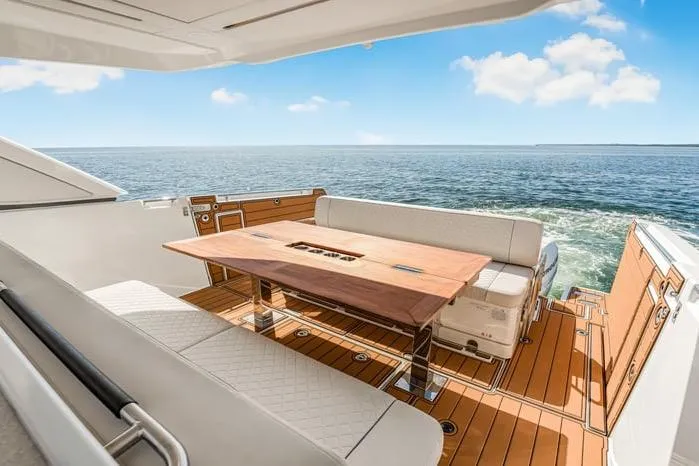 Slide: The Image of Luxurious Jeanneau DB 43 yacht deck with elegant seating and ocean view, 2026 model. - 7