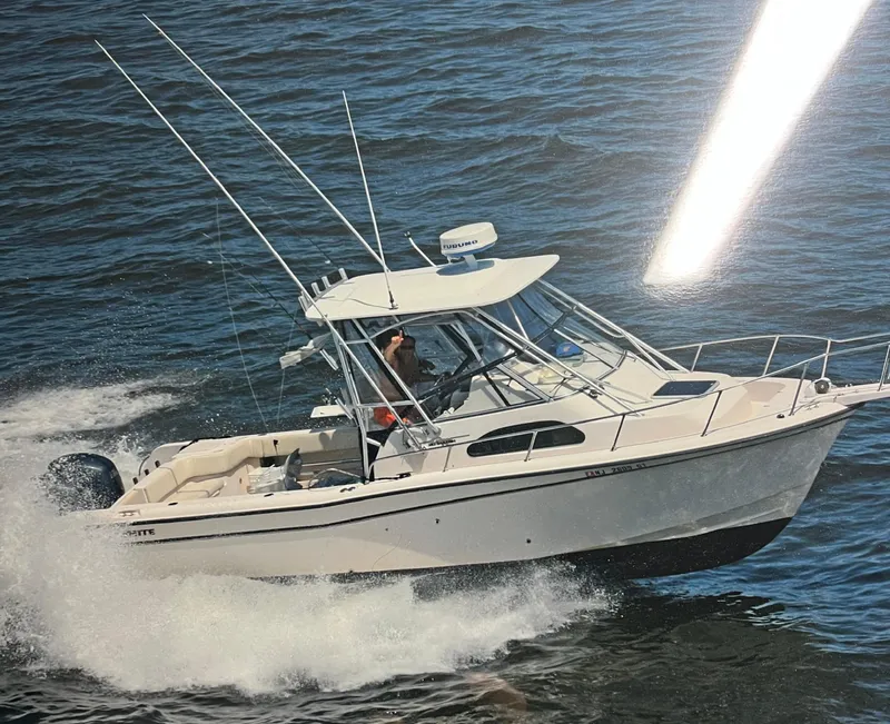 The Image of 2003 Grady-White 282 Sailfish WA boat cruising on open water. - 0