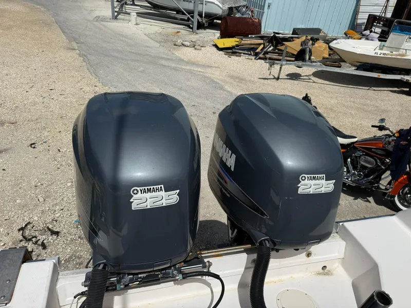 Slide: The Image of Twin Yamaha 225 outboard engines on a 2003 Grady-White Sailfish 282 boat. - 17