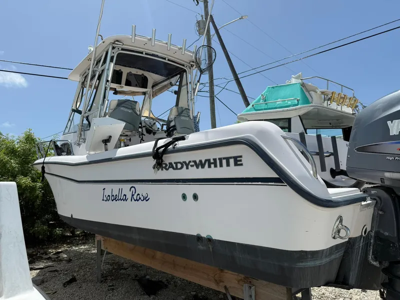 Slide: The Image of 2003 Grady-White 282 Sailfish WA boat with people fishing onboard. - 3
